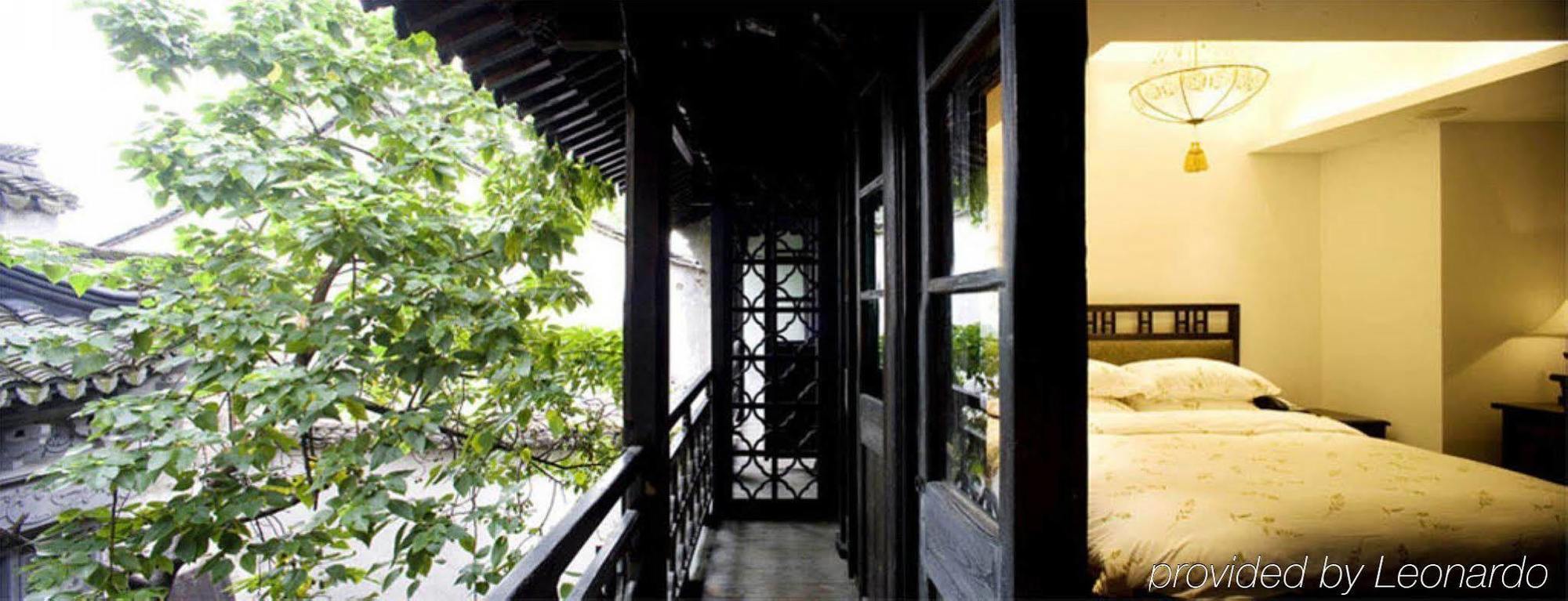 Wuzhen Clubhouse Hotell Jiaxing Rum bild